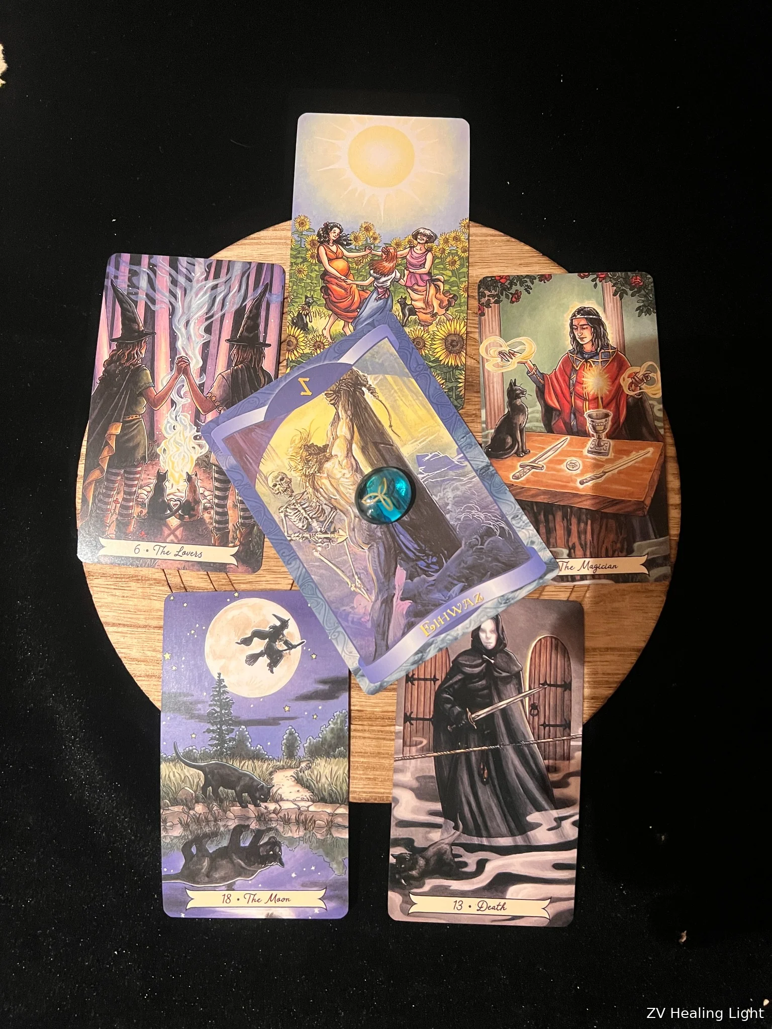 Zac’s tarot cards arranged on a circular reading board